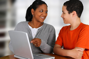 Teacher and student reviewing class progress